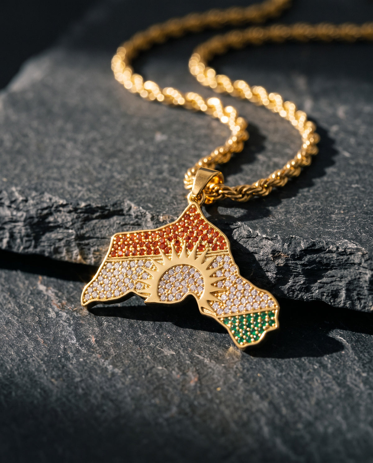 Kurdistan necklace for men in 18K gold, map of Kurdistan pendant with red, white and green zirconia around the sun, rope chain, macro of the pendant and the zirconia stones