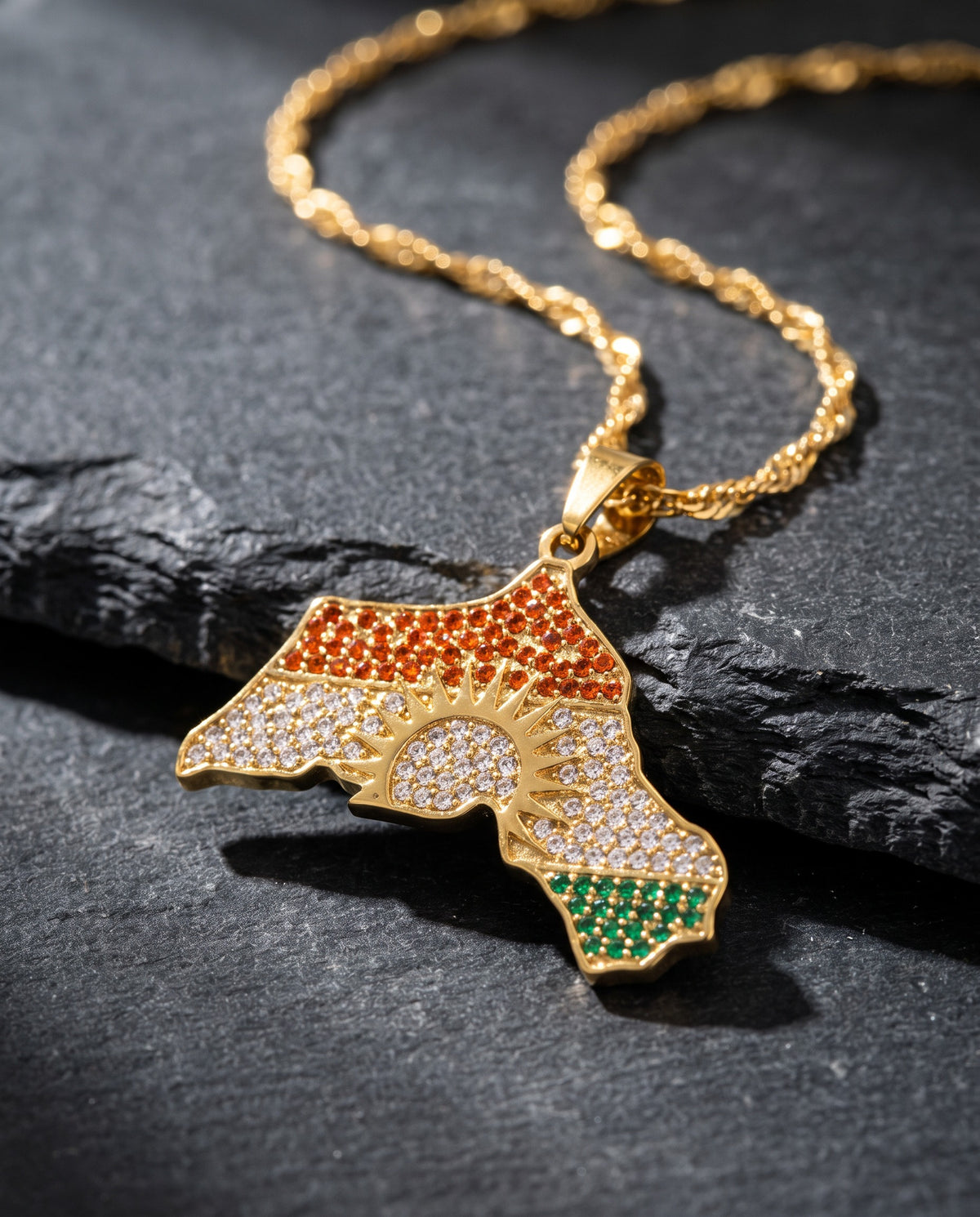 Kurdistan necklace for women in 18K gold, map of Kurdistan pendant with red, white and green zirconia around the sun, fine wave chain, macro of the pendant and the zirconia stones