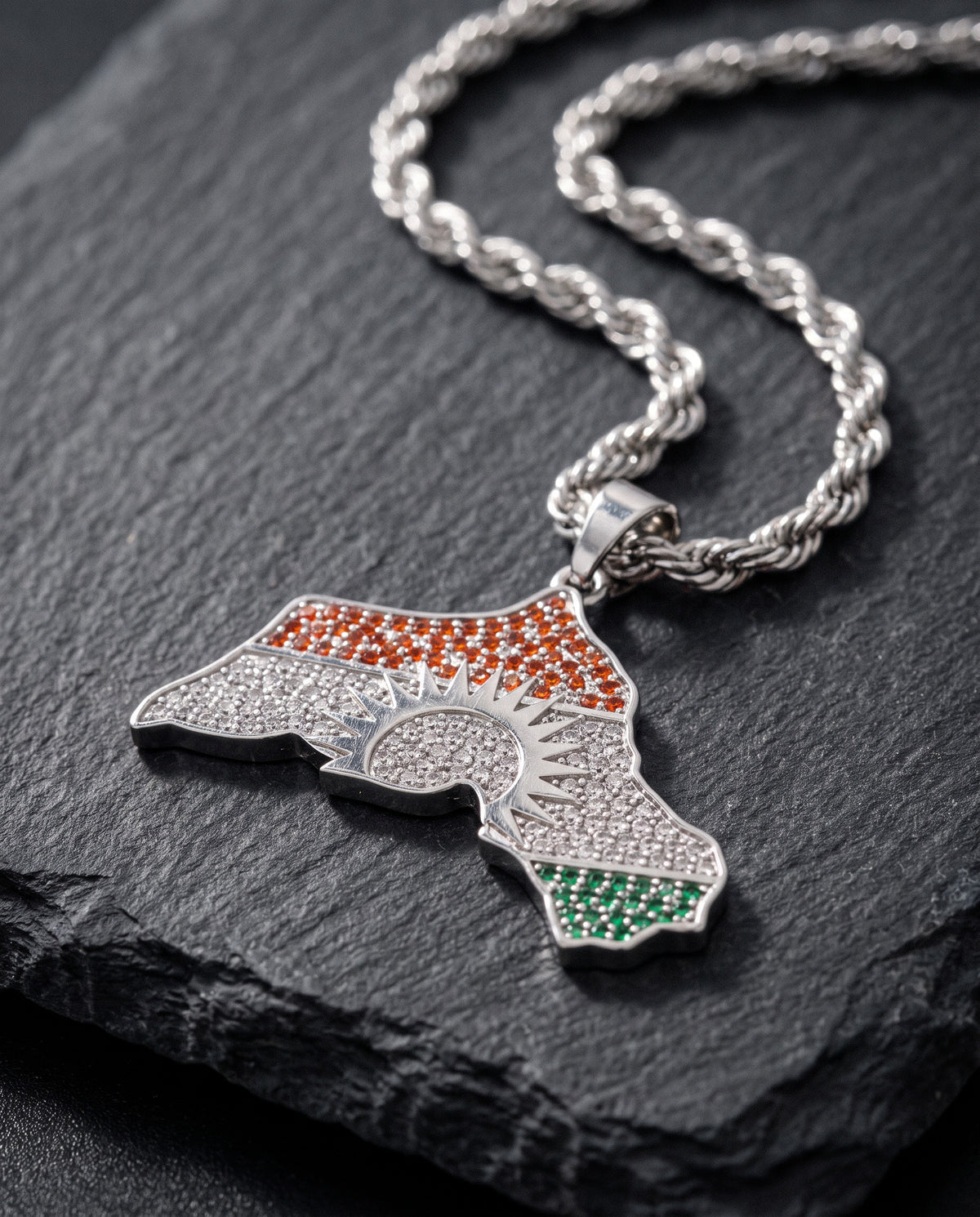 Kurdistan necklace for men in silver, map of Kurdistan pendant with red, white and green zirconia around the sun, rope chain, macro of the pendant and the zirconia stones